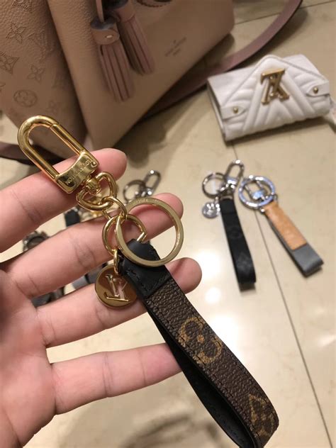 lv key lock chain|louis vuitton keychain pouch.